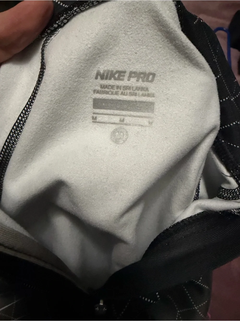 Nike Pro Women’s Black and Pink Long-Sleeve Zip Performance Shirt